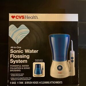 CVS All-In-One Sonic Water Flossing System. 6 attachments with 2 exclusive tips.